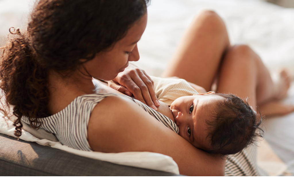 Woman breastfeeding child